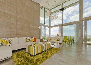 Great stylish living area with huge windows and ocean views. House in New Zealand